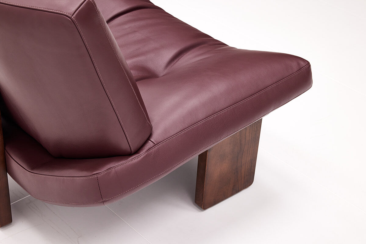 Side profile detail of Emmi Armchair Replica