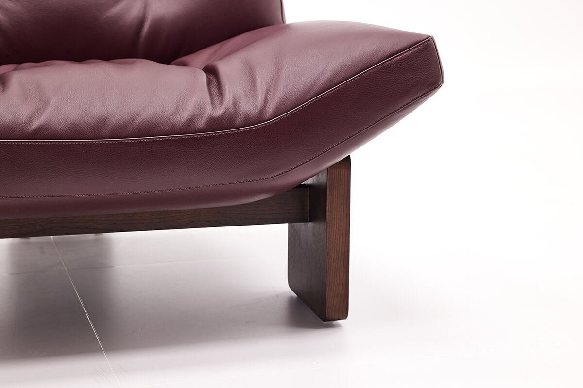 Timber base detail of Emmi Armchair Replica