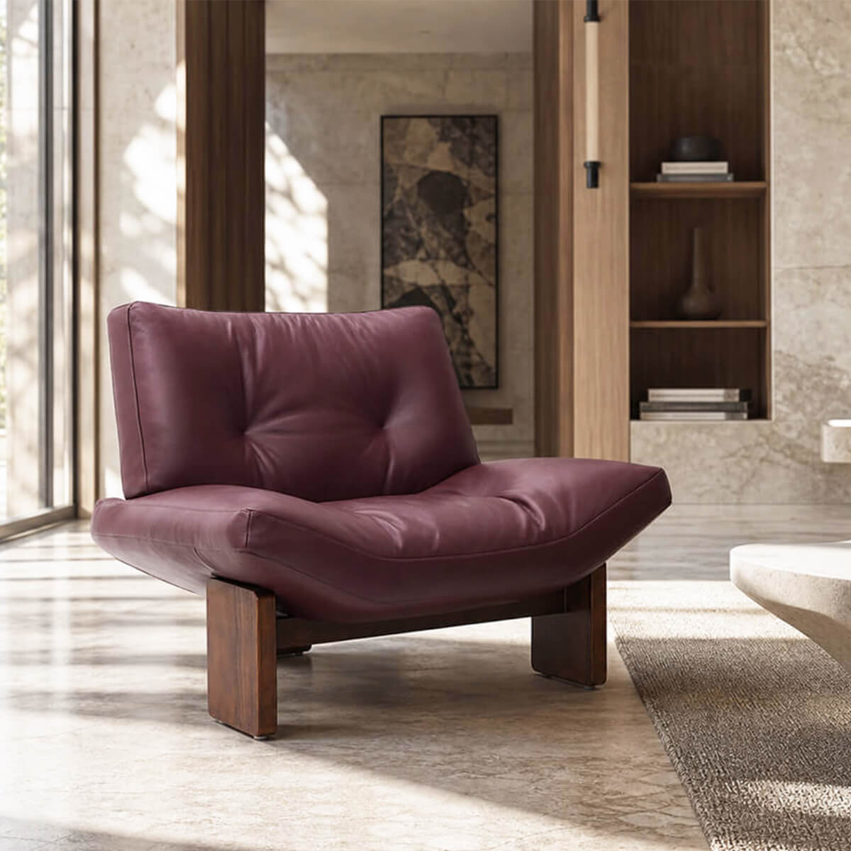 Emmi semi-aniline leather armchair with sculptural timber base
