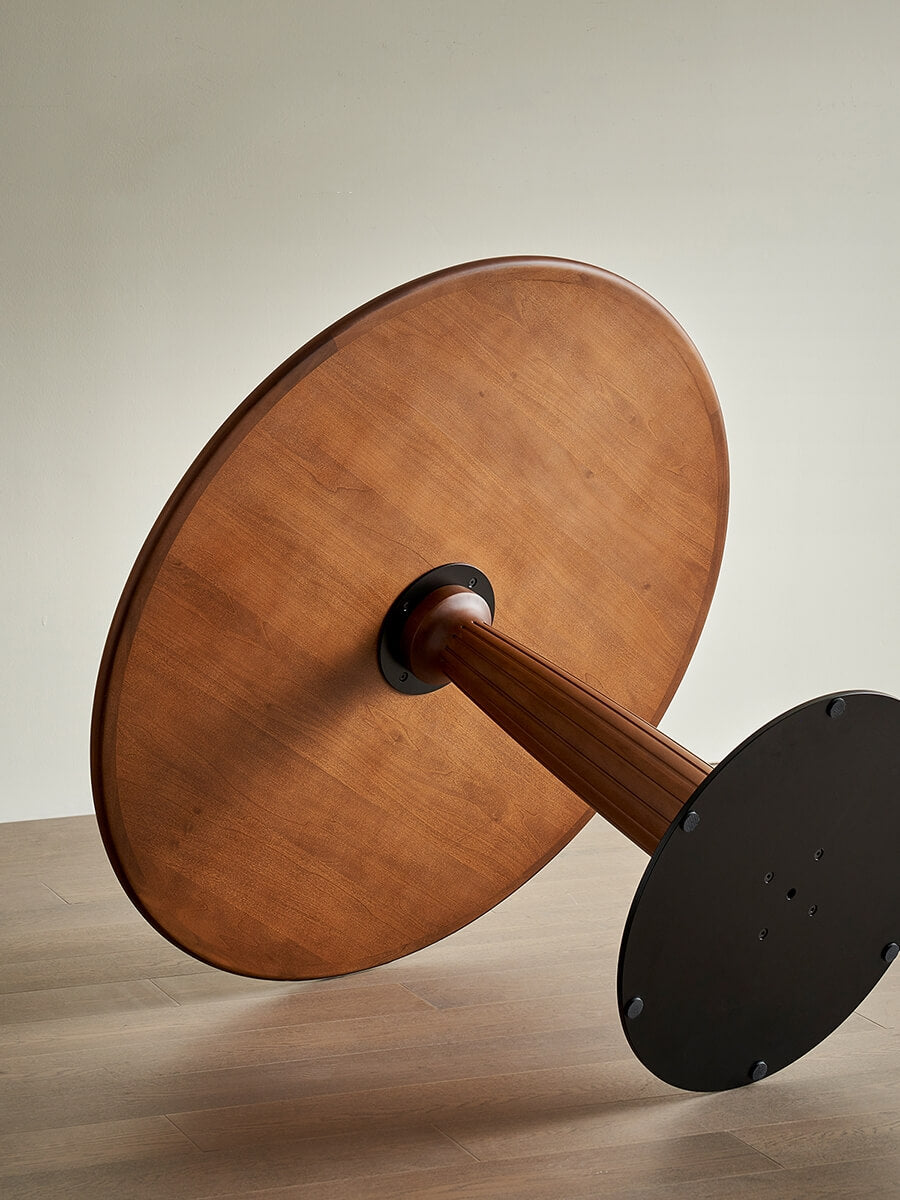 Close-up of Evanston round dining table base