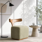 Falun designer stool with solid American ash frame in a contemporary living room reading corner
