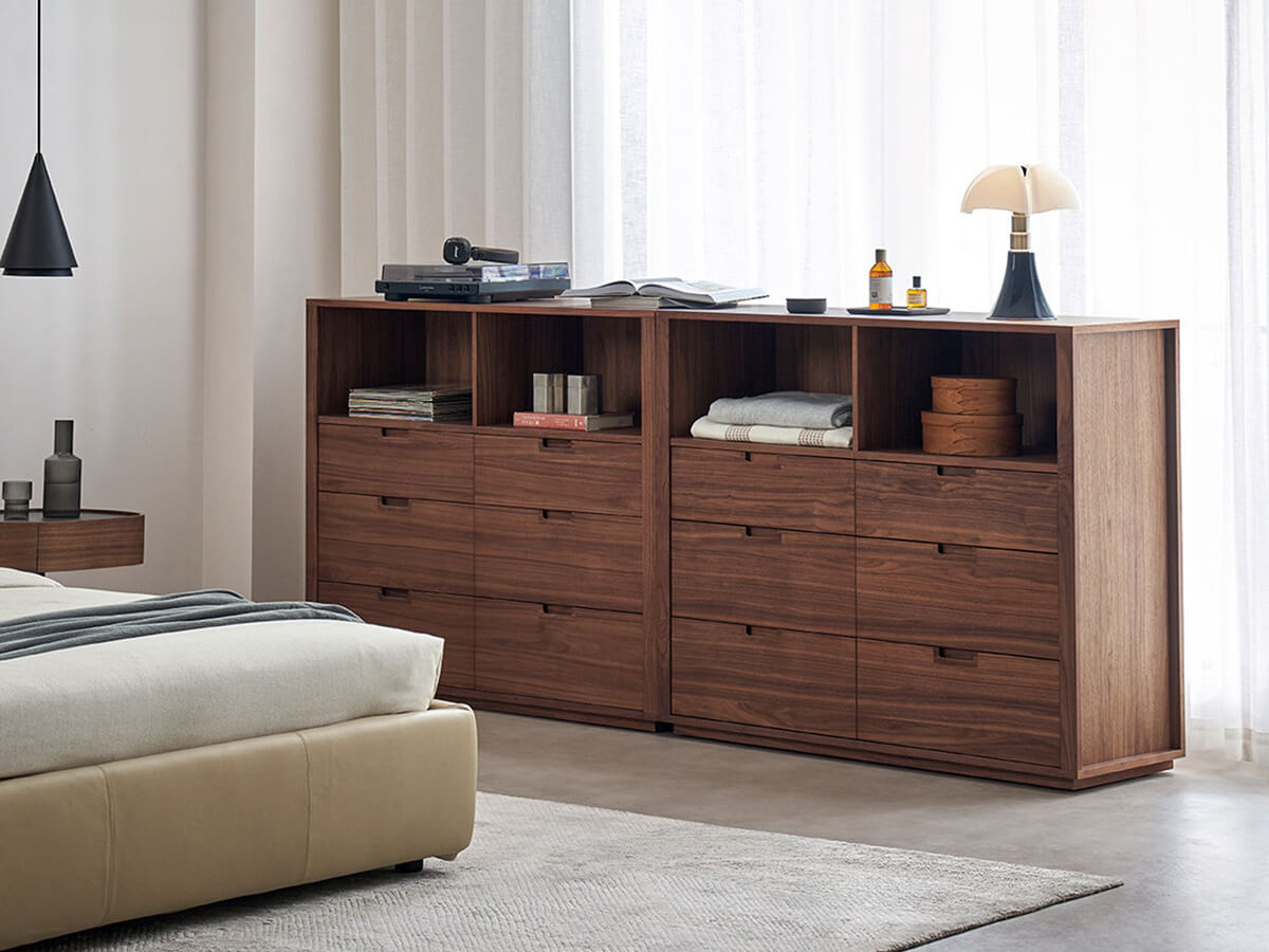 Feda Walnut Drawer Cabinet in bedroom setting