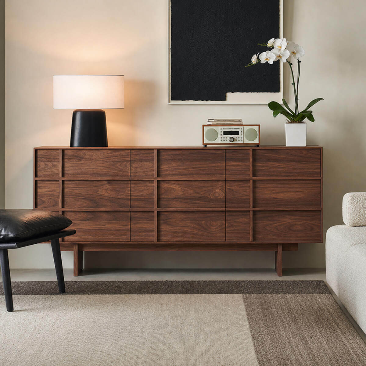 Field Chest of 9 Drawers in walnut finish styled in a contemporary living room