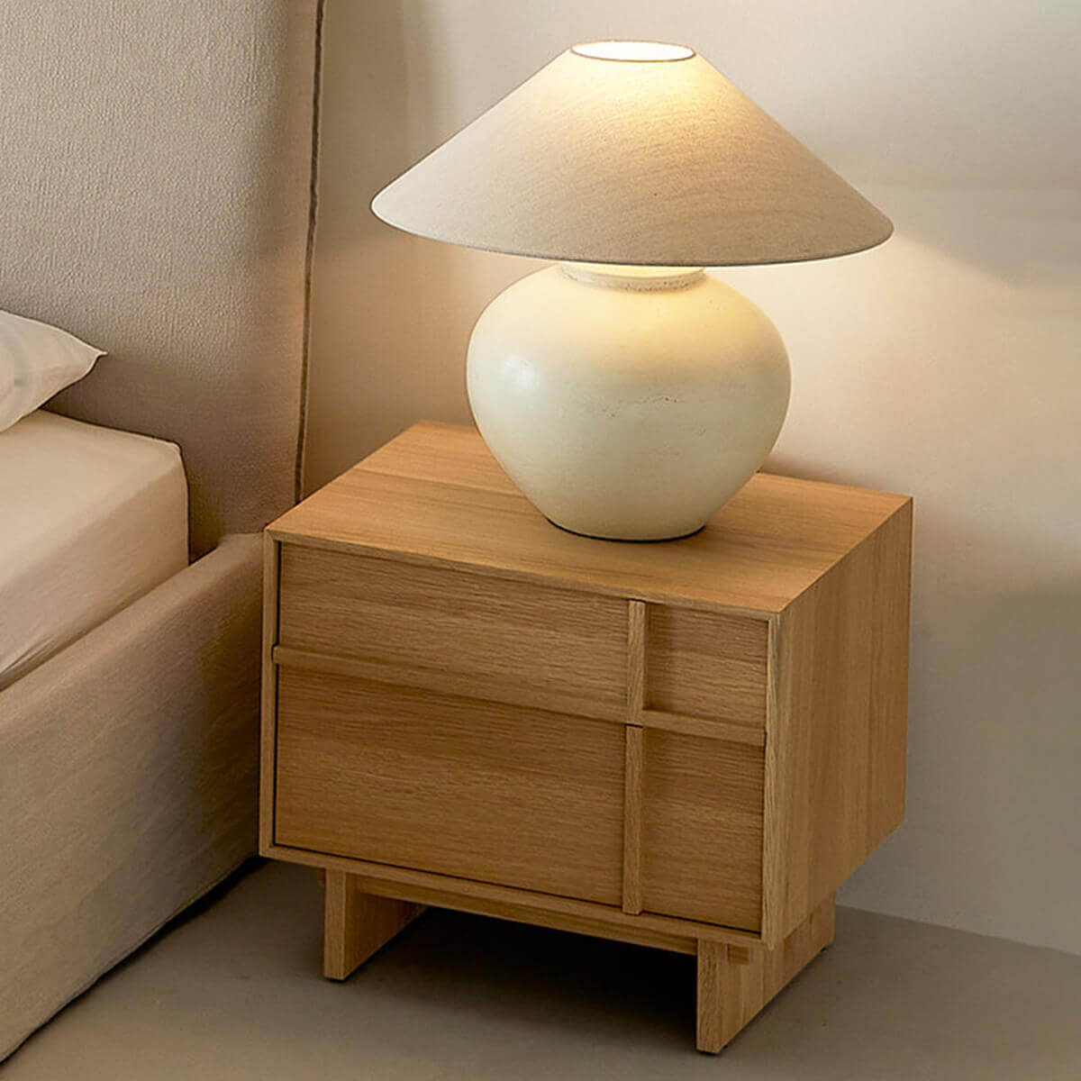 field oak bedside table in a contemporary bedroom