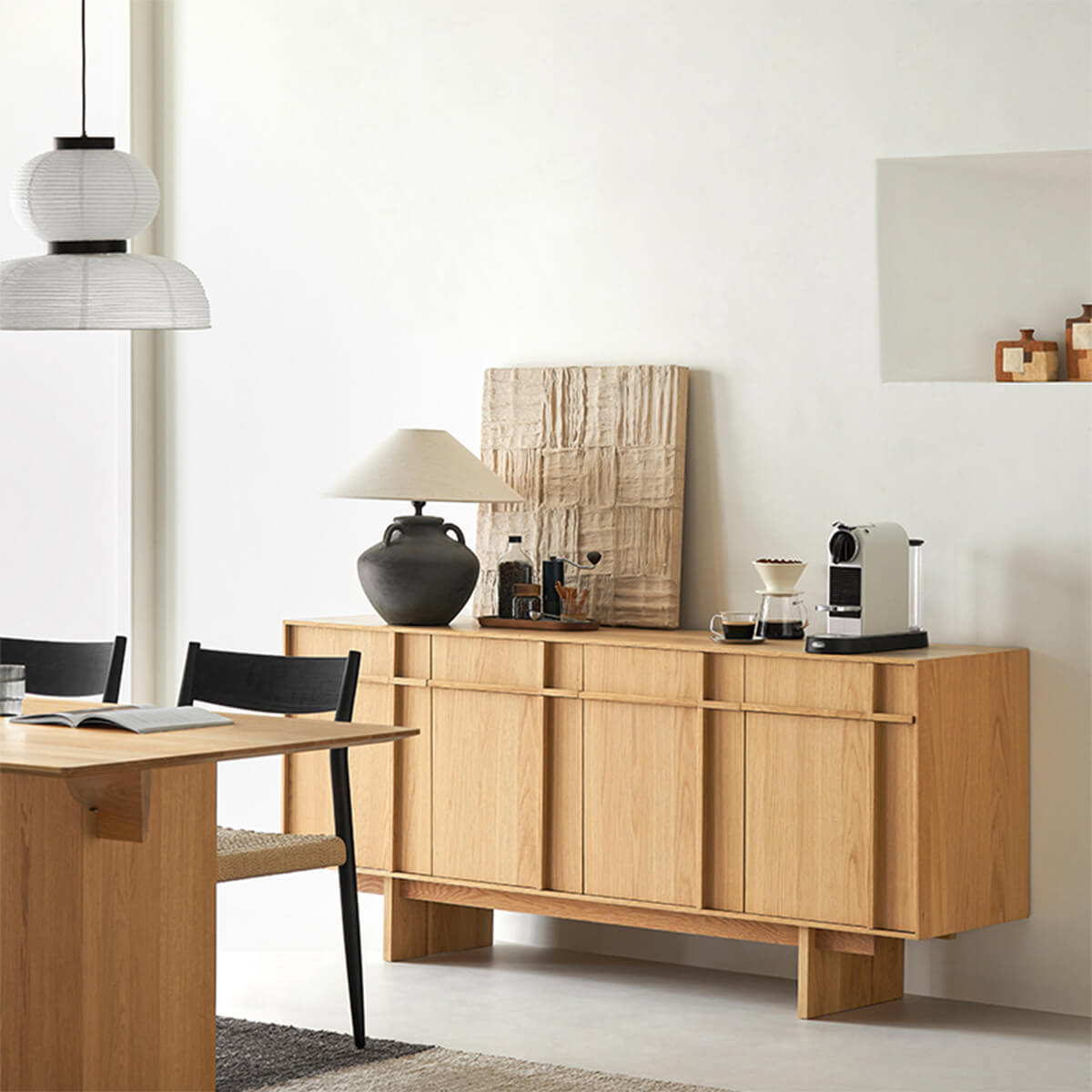 Field Sideboard natural finish styled in a dining room