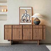 Field Sideboard in walnut finish styled in a contemporary living room