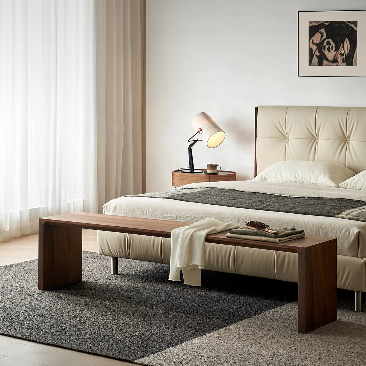 Flemington solid walnut bench at the foot of a bed