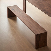Flemington solid walnut bench close-up showing continuous wood grain
