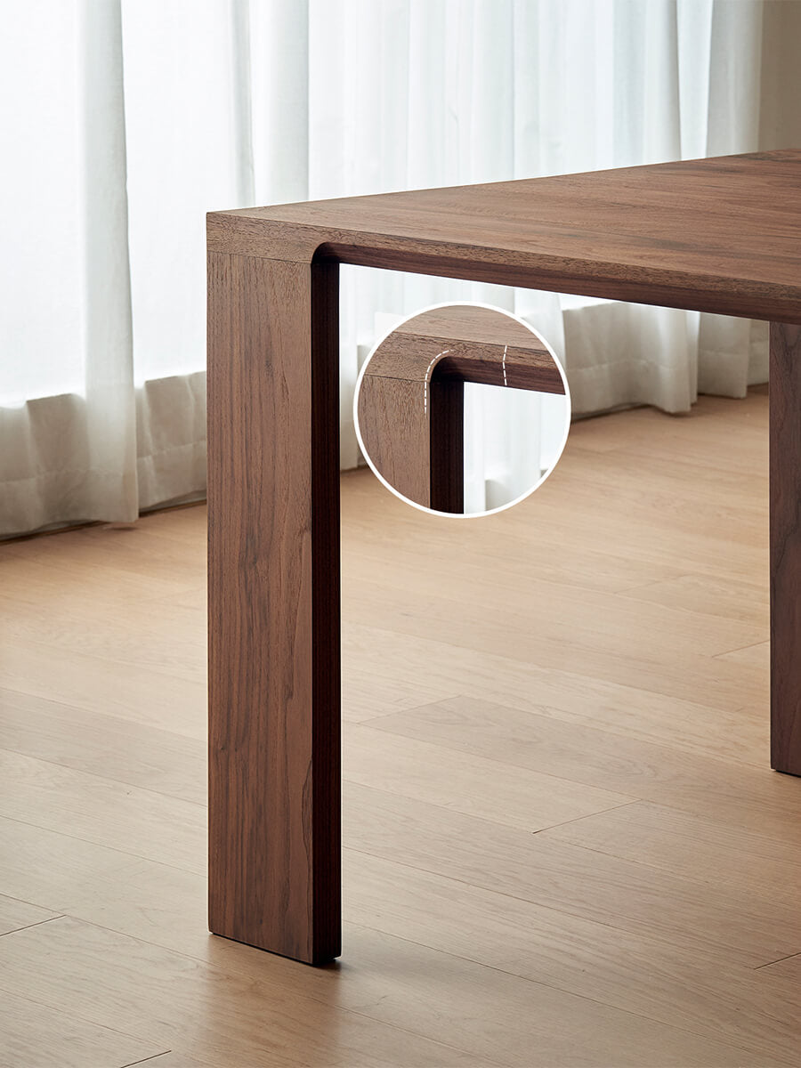 Rounded corner detail on Flemington solid walnut dining table