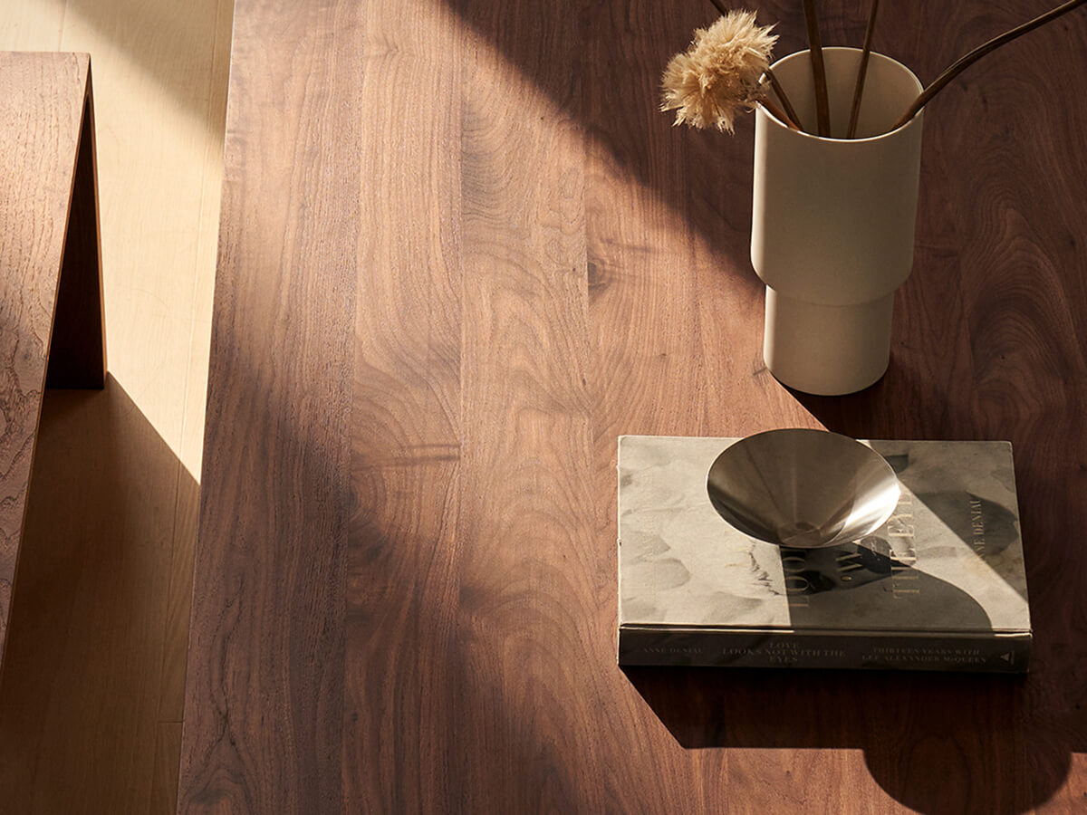 Natural walnut grain detail on Flemington dining table