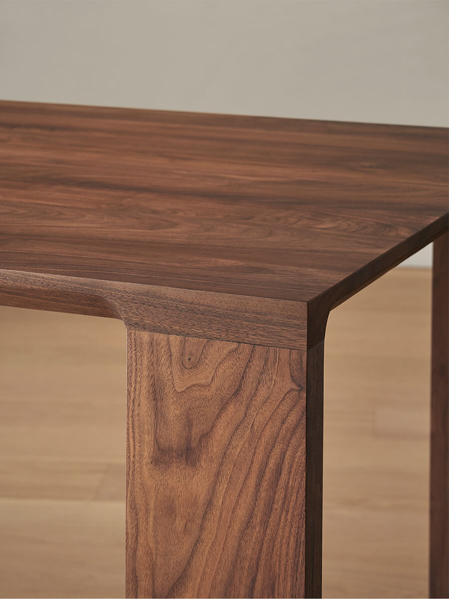 Waterfall leg detail of Flemington solid walnut dining table
