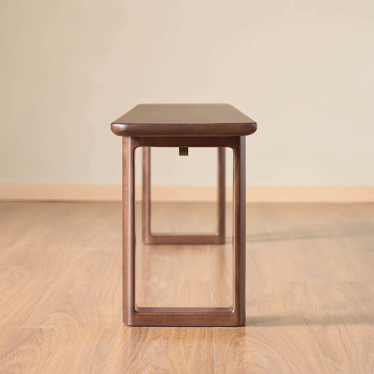 End view of the Forma Solid Walnut Dining Bench