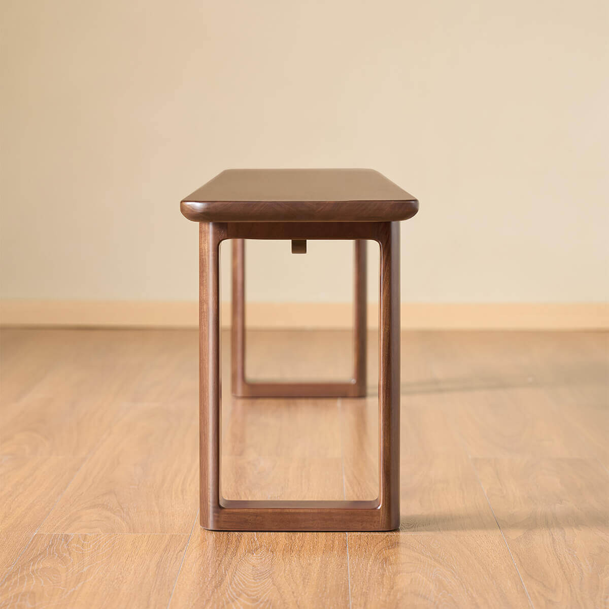 End view of the Forma Solid Walnut Dining Bench
