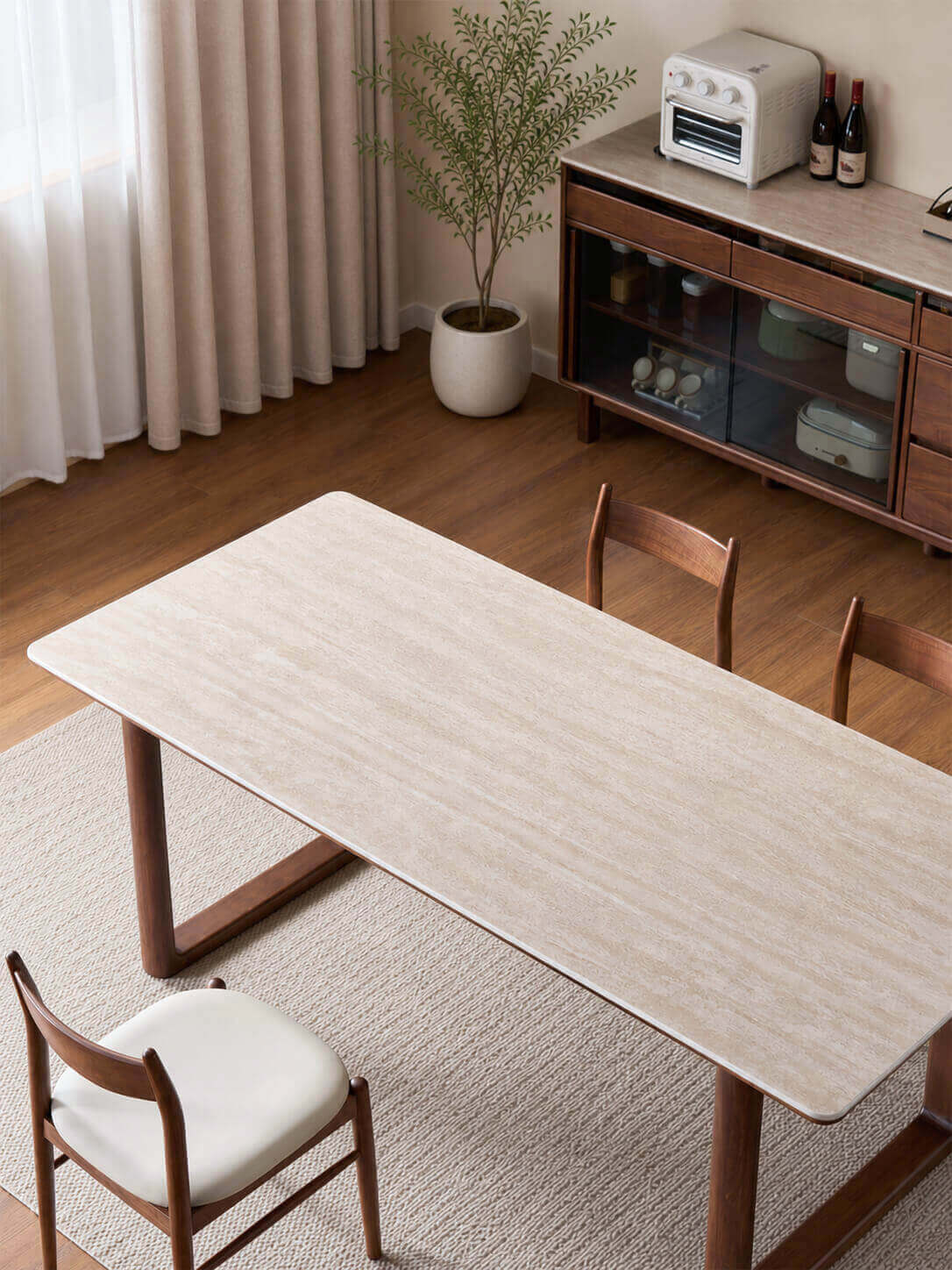 Top view of the Forma Solid Walnut Sintered Stone Dining Table
