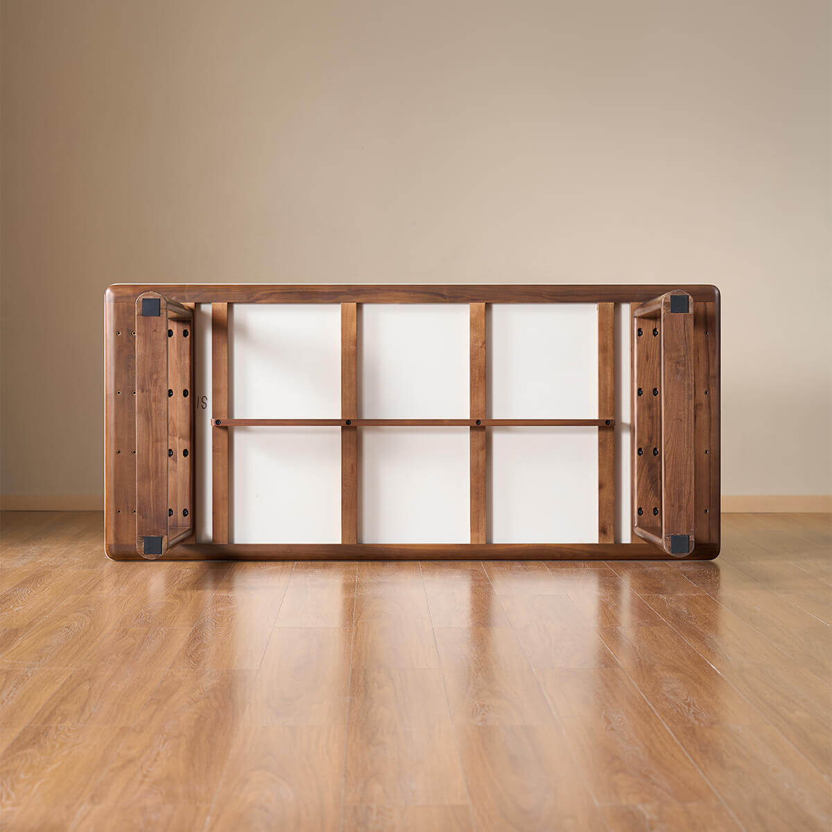Underside construction of the Forma Solid Walnut Sintered Stone Dining Table