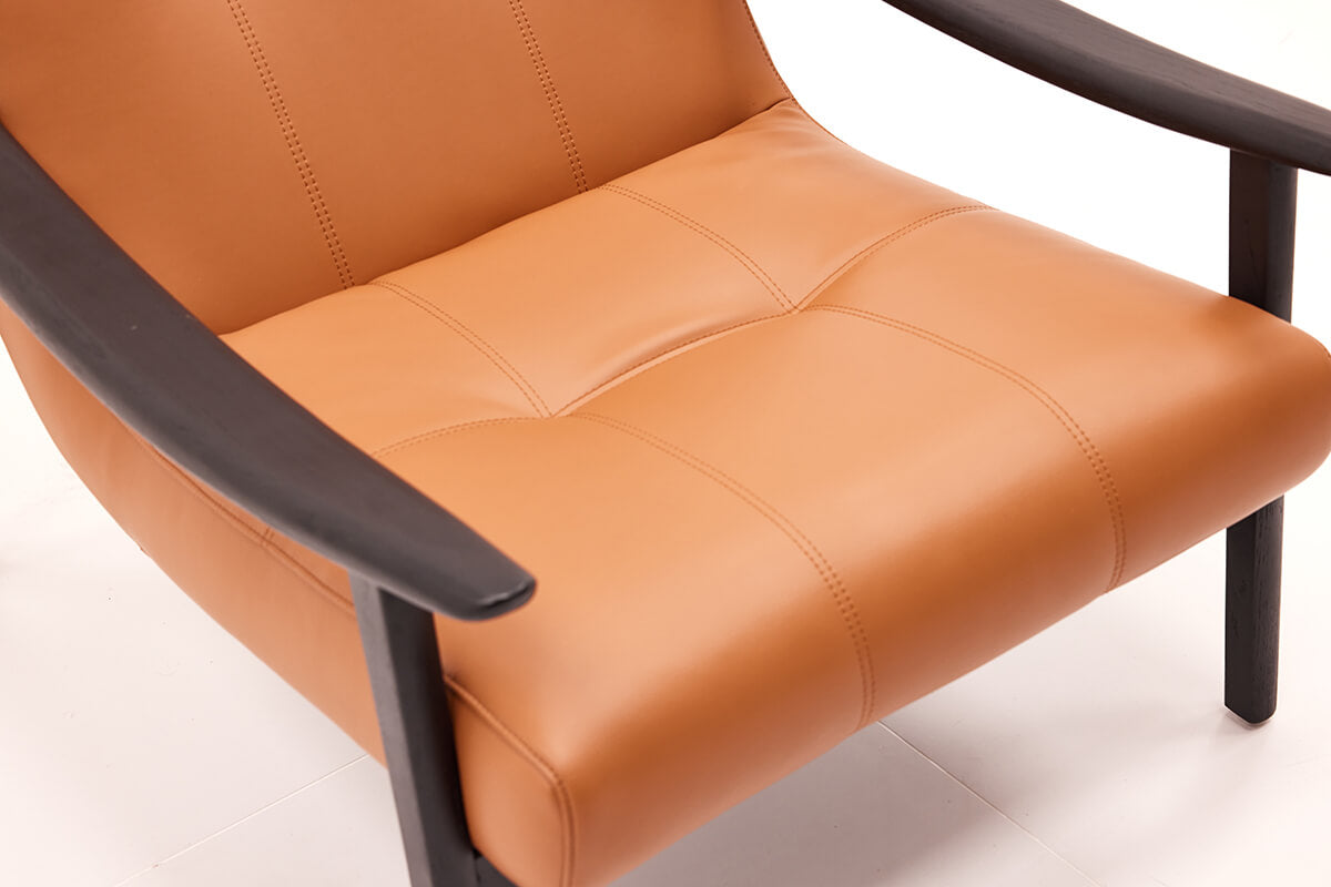 Full grain leather seat detail of Fynn armchair