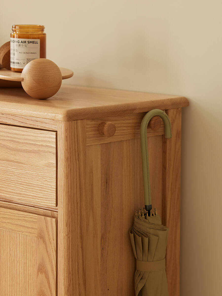 Built-in umbrella hook on the side of the Gamo solid oak shoe cabinet