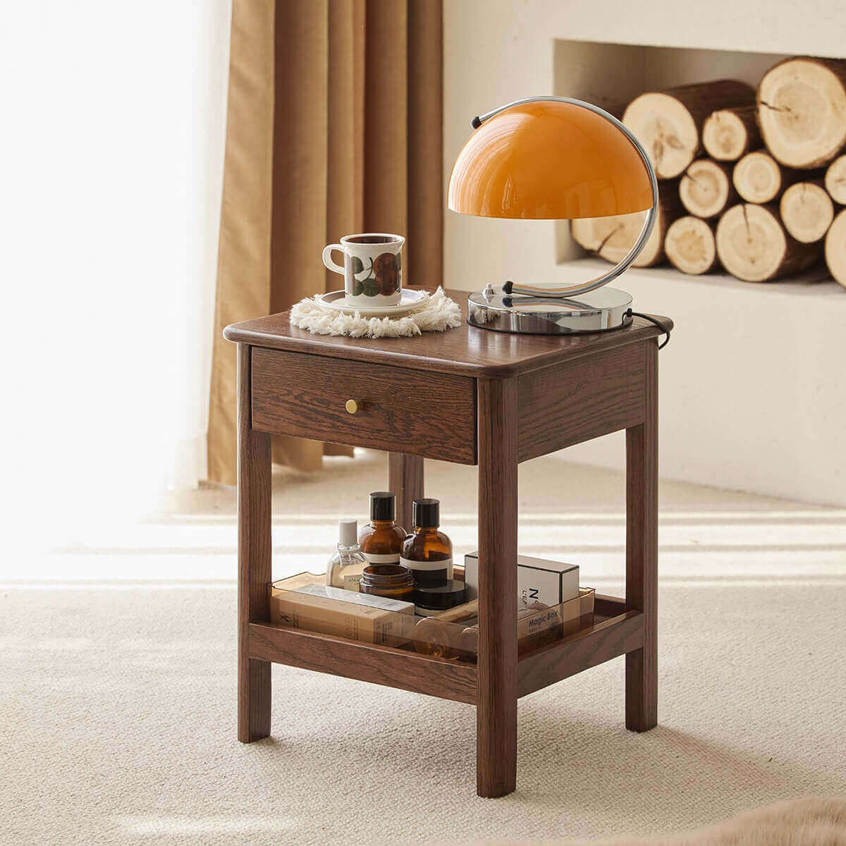 Gamo walnut stained side table beside a lounge chair in a reading corner