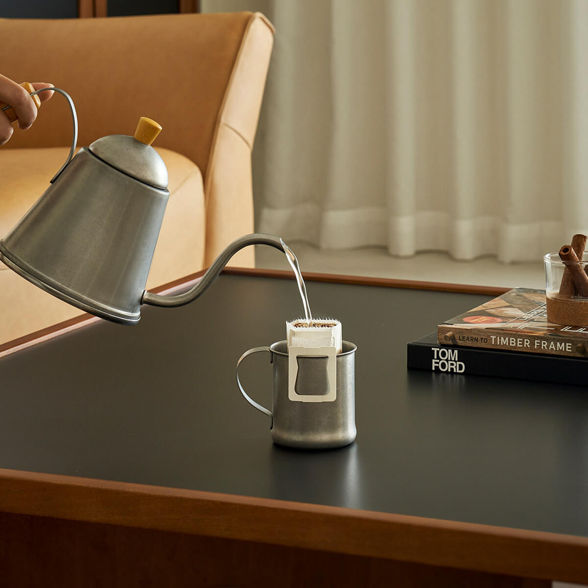 Heat-resistant black sintered stone top on the Gentle Coffee Table