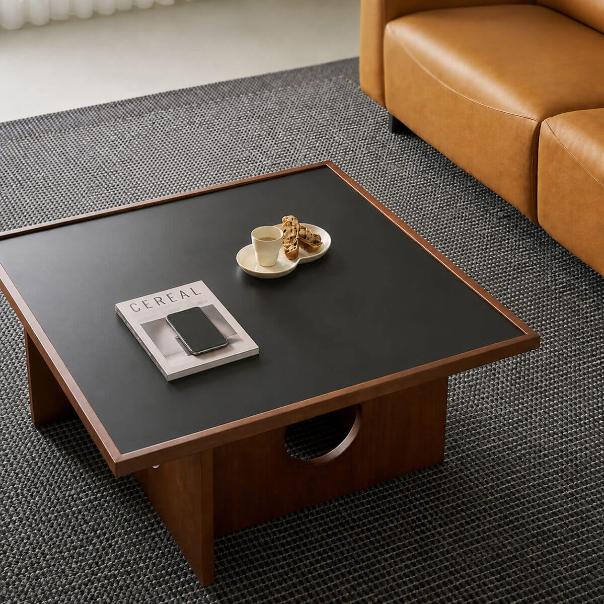 Gentle Black Sintered Stone Coffee Table in a modern living room
