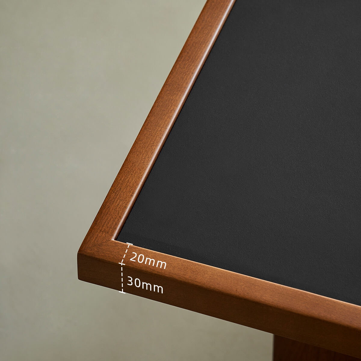 Close-up of the solid boxwood edge on the Gentle Black Sintered Stone Coffee Table