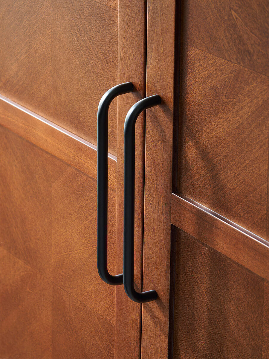 Close-up of the Gentle Designer Cabinet metal handles