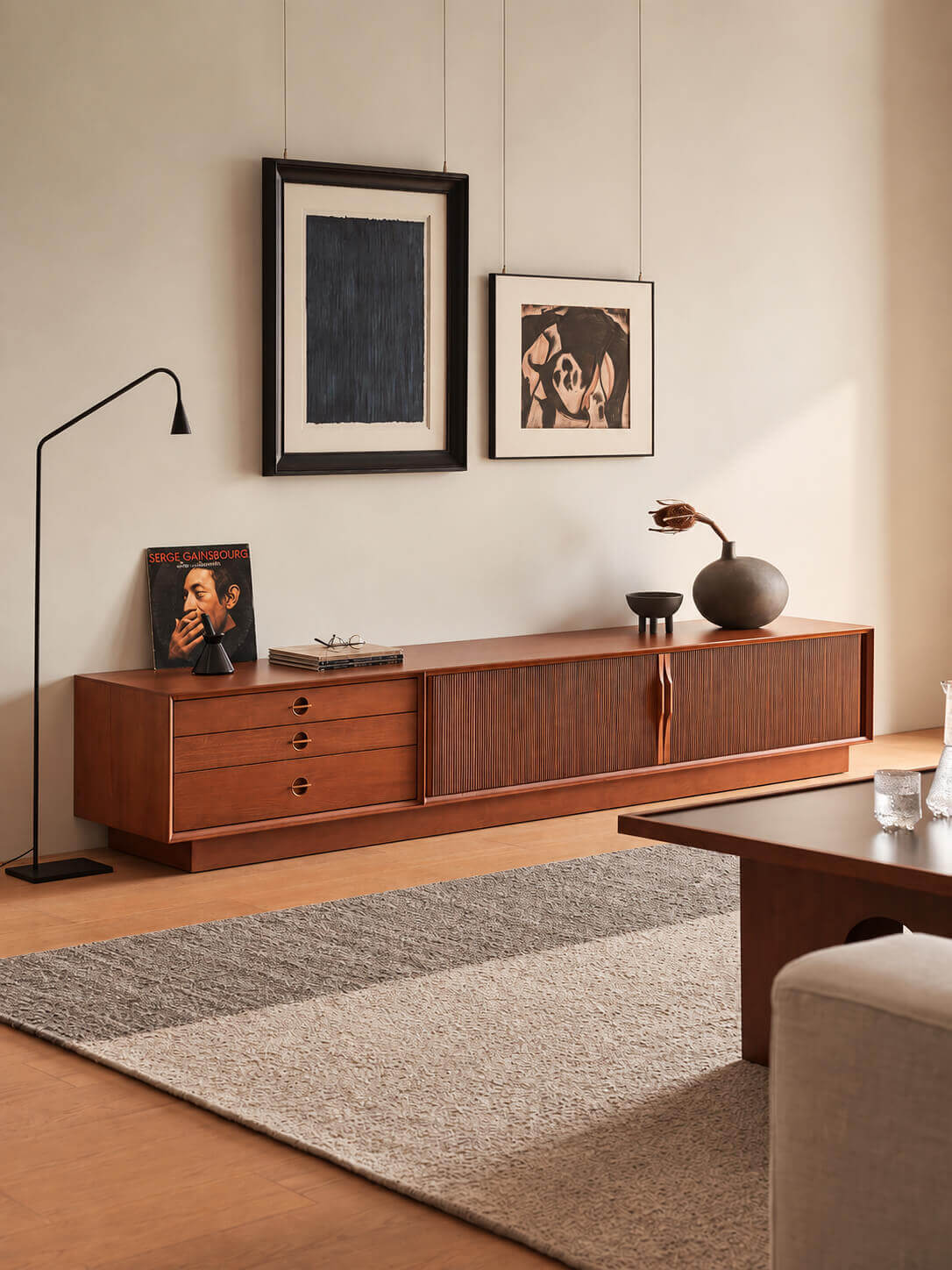 Gentle Tambour TV Unit with plinth base in natural finish in living