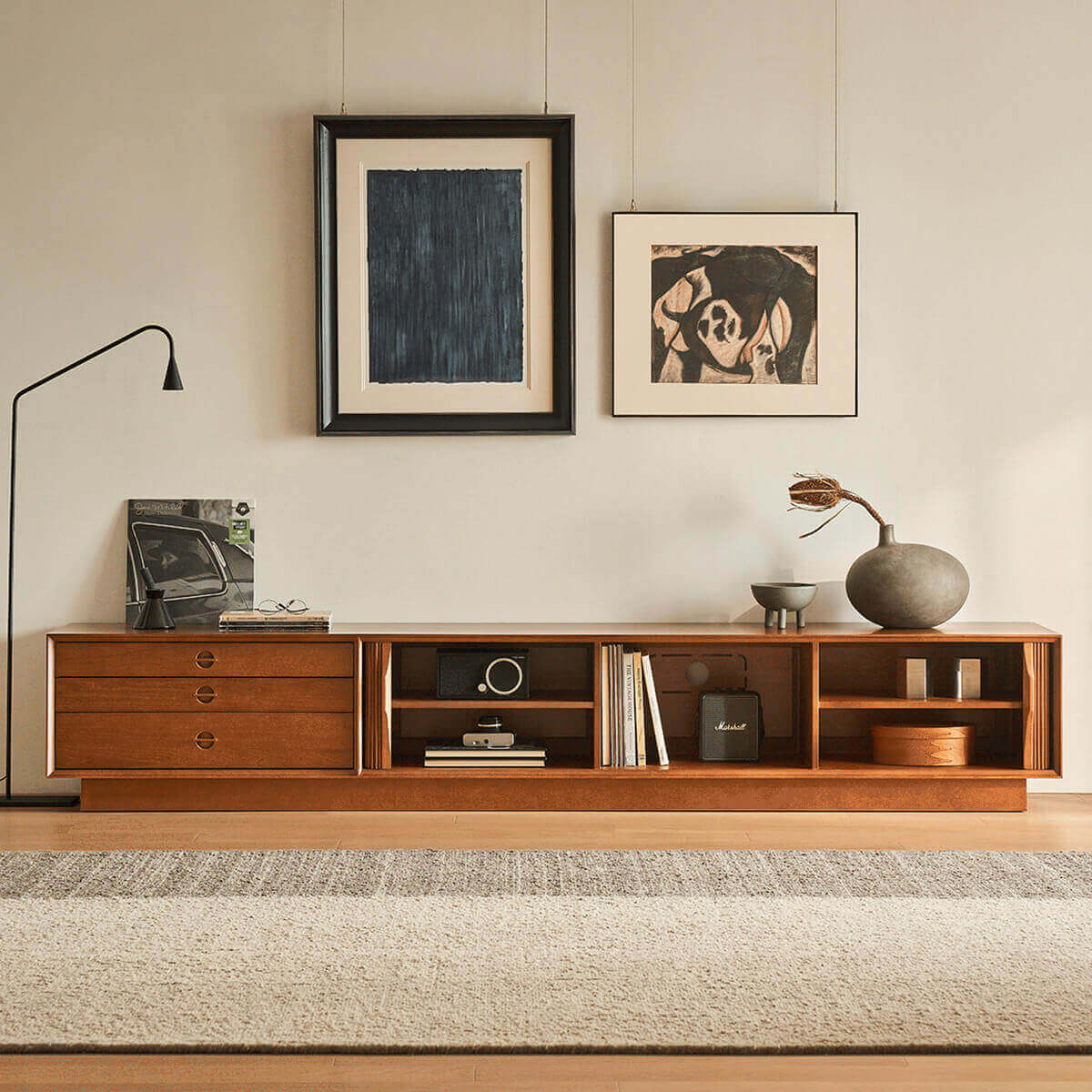 Open storage compartments of the Gentle Tambour TV Unit in natural finish