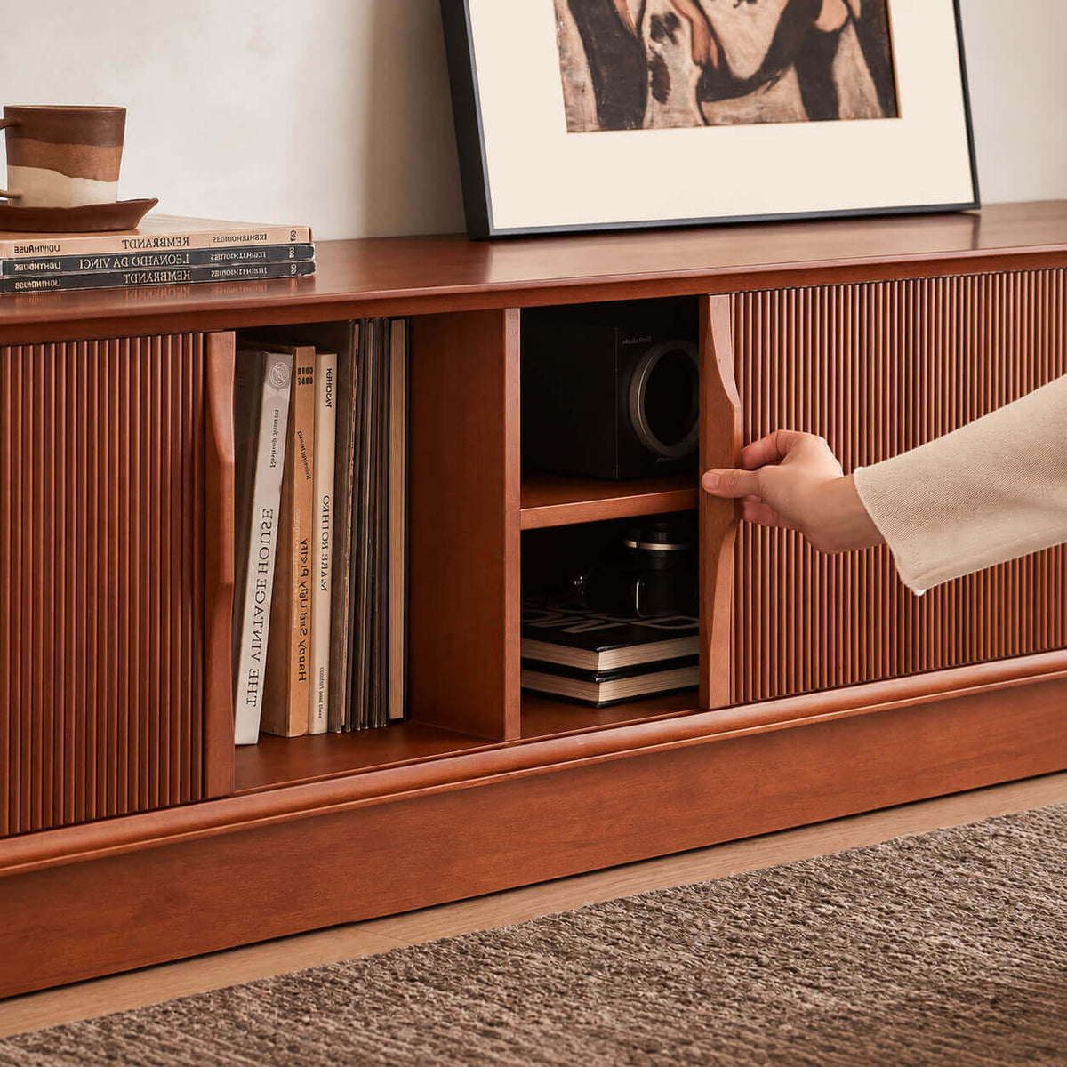 Gentle Tambour TV Unit with plinth base sliding door detail