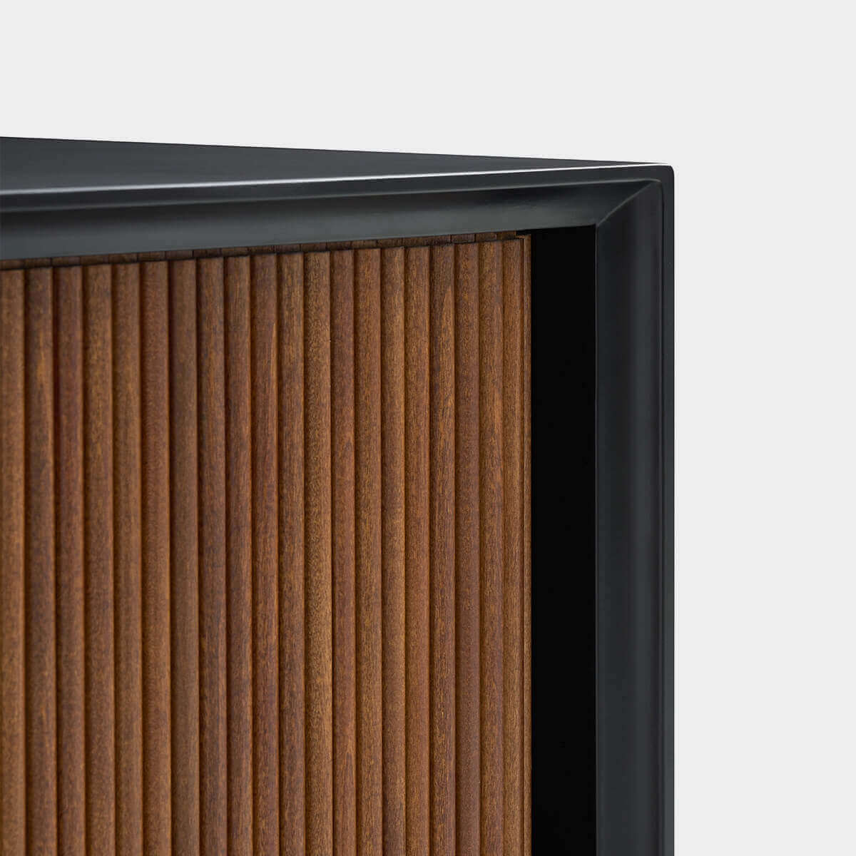 Tambour door and two-tone frame detail of the Gentle Tambour TV Unit