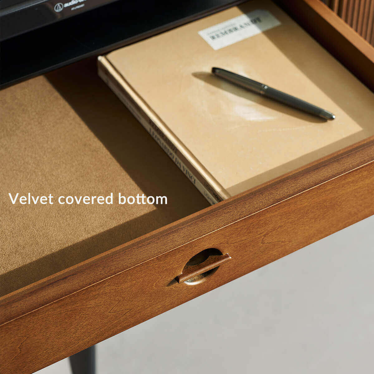 Velvet-lined drawer inside the Gentle Tambour TV Unit