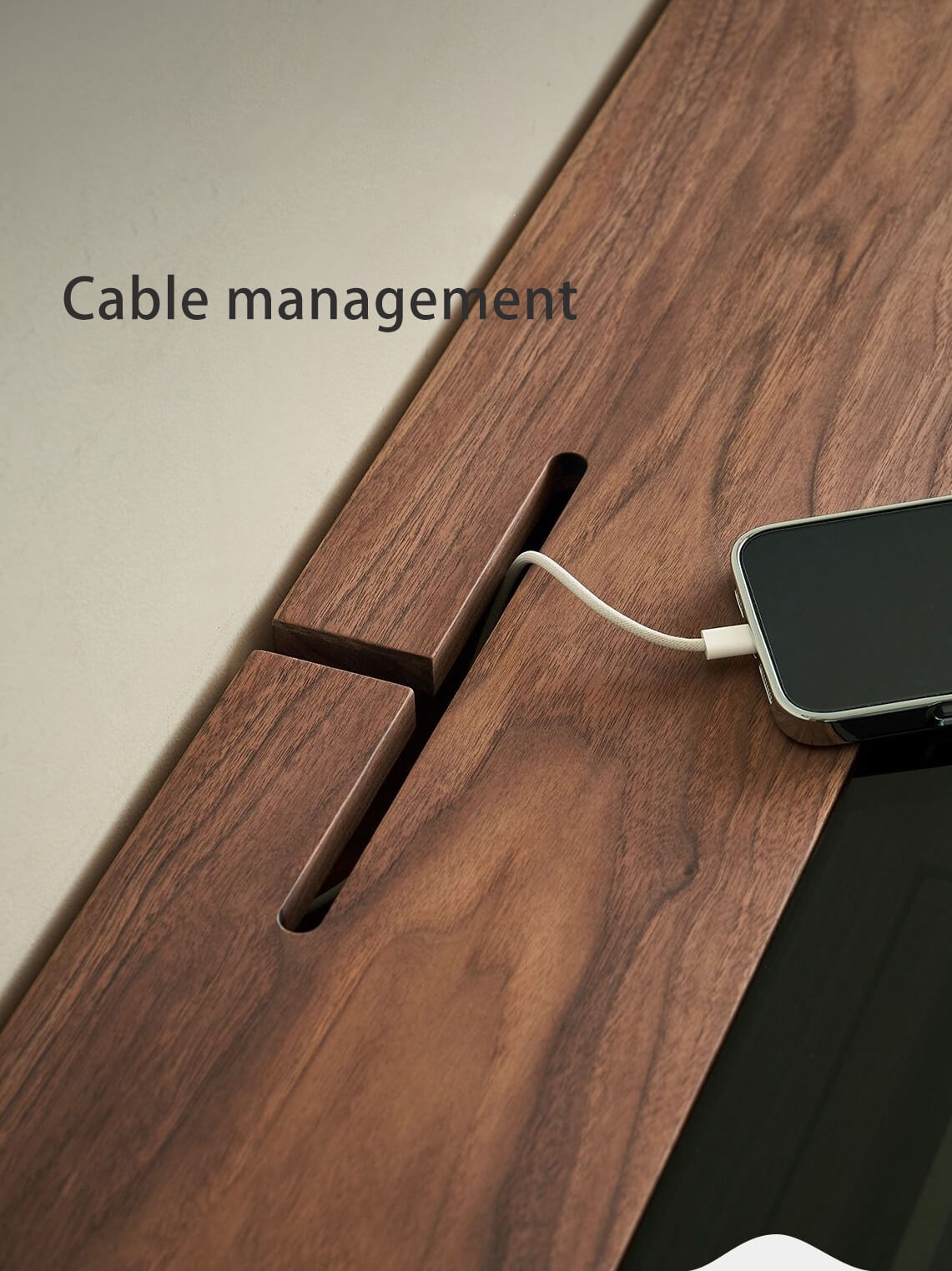 Integrated cable management system on Glenn solid walnut desk