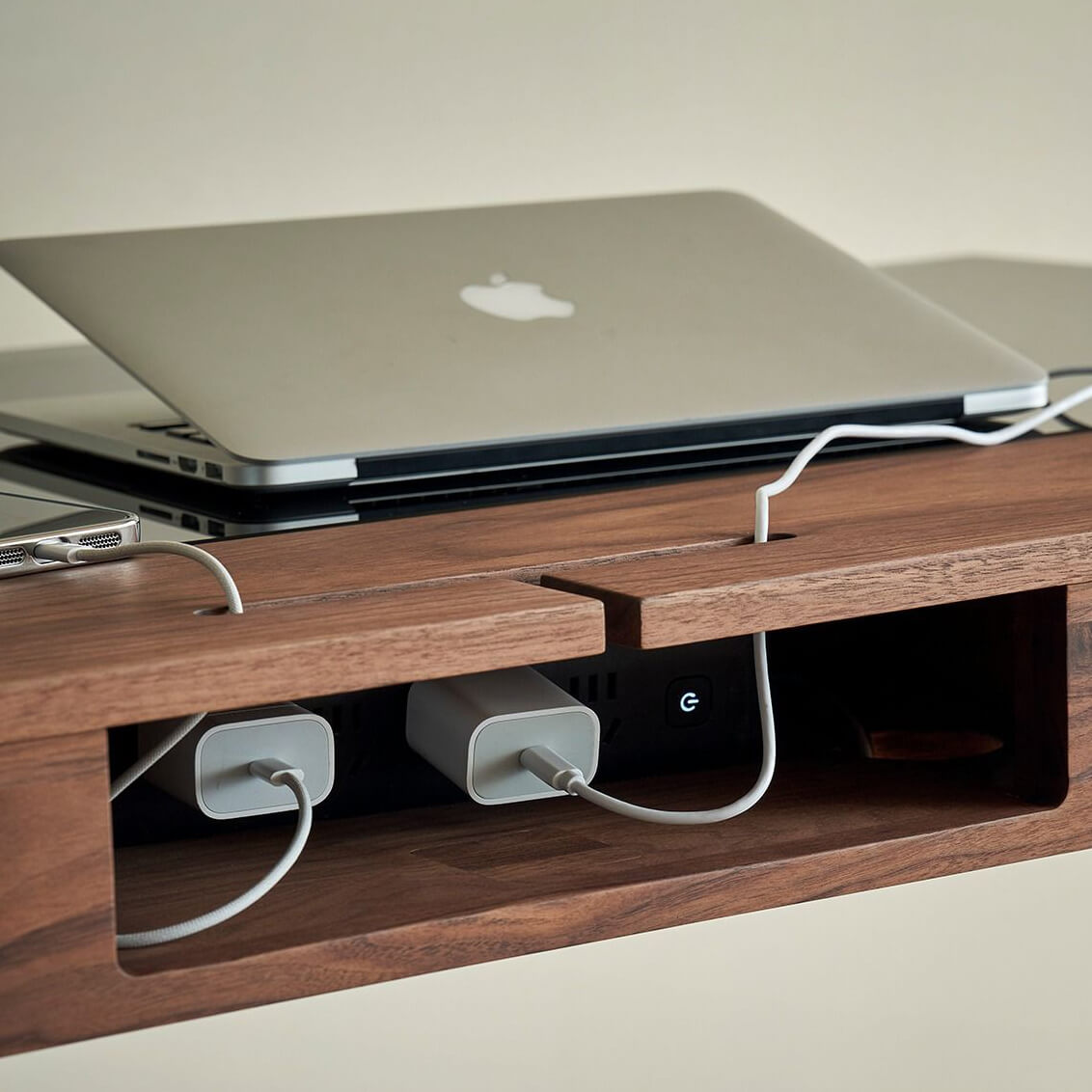 Integrated storage compartment for devices and chargers