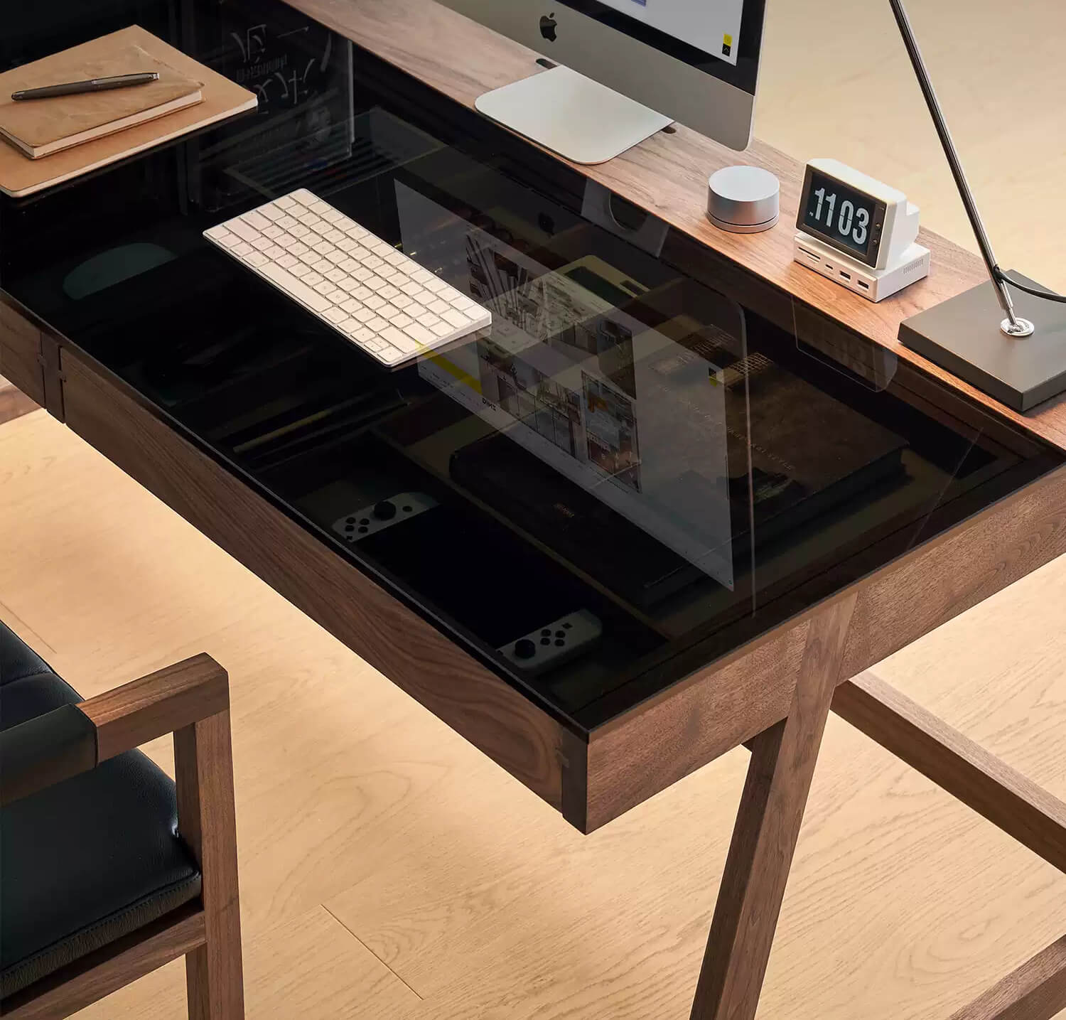 Tempered glass desktop detail on Glenn solid walnut desk
