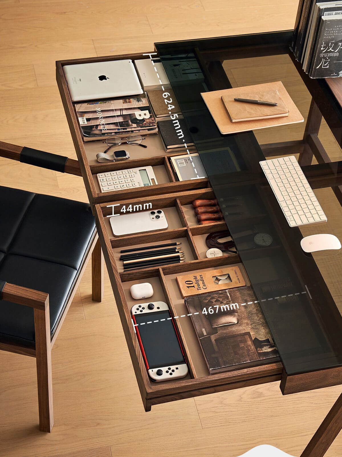 Hidden storage compartments inside Glenn solid walnut desk