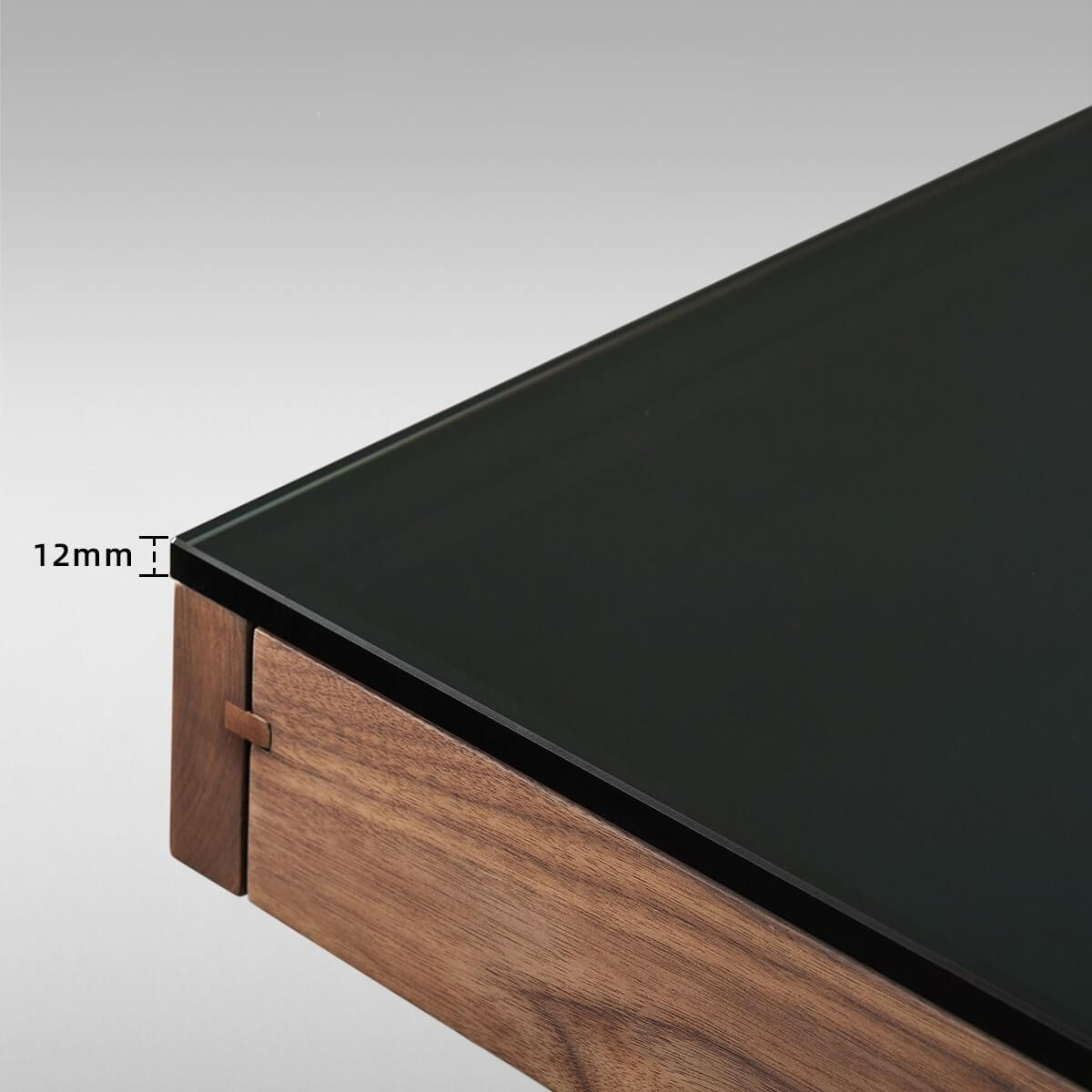 12mm tempered glass desktop detail on Glenn solid walnut desk