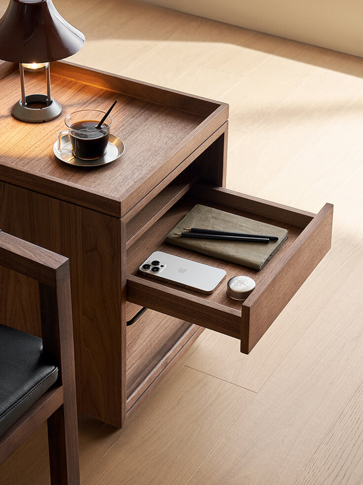 Upper drawer and open shelf of the Glenn walnut storage pedestal