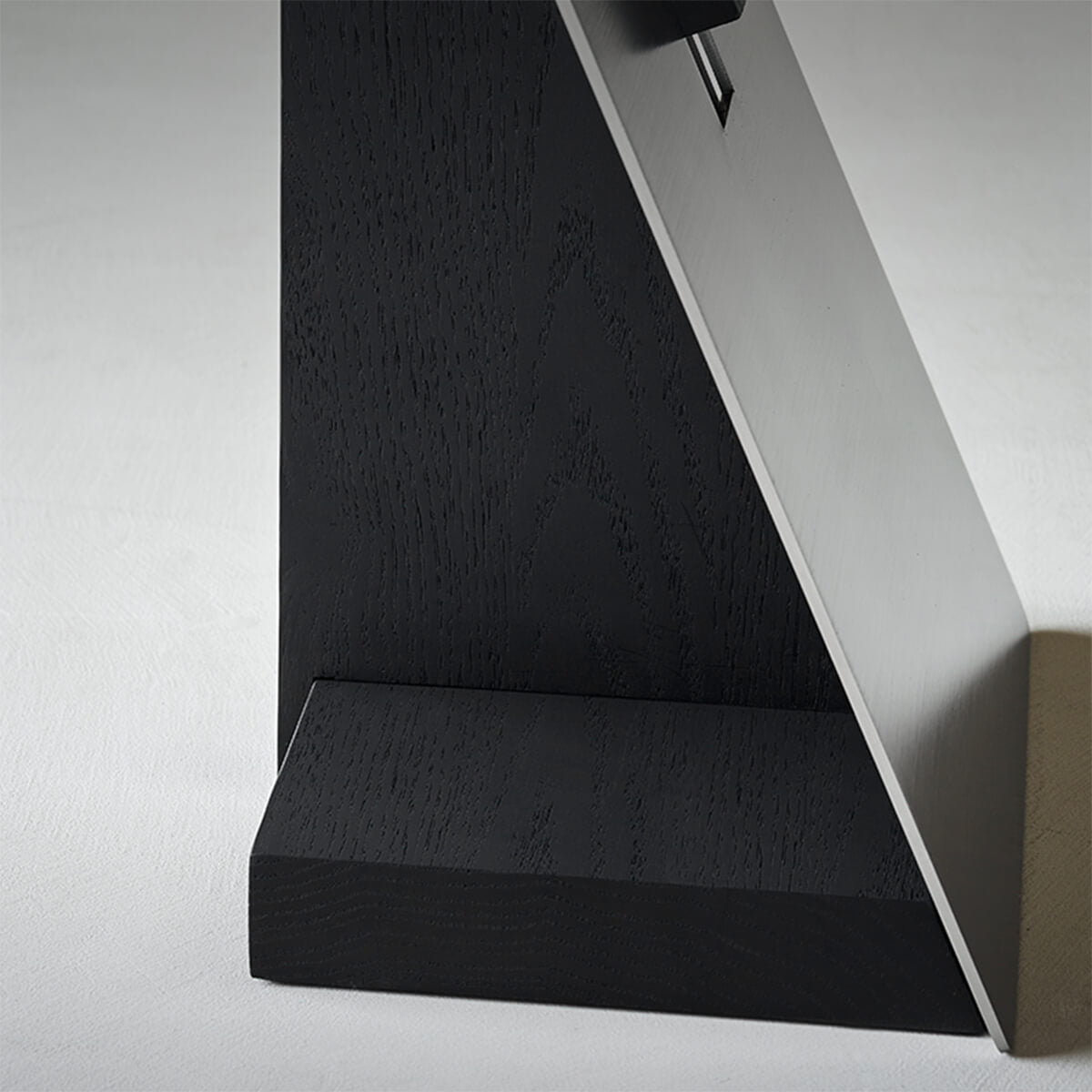 Close-up of the Graham side table with a black solid American oak base