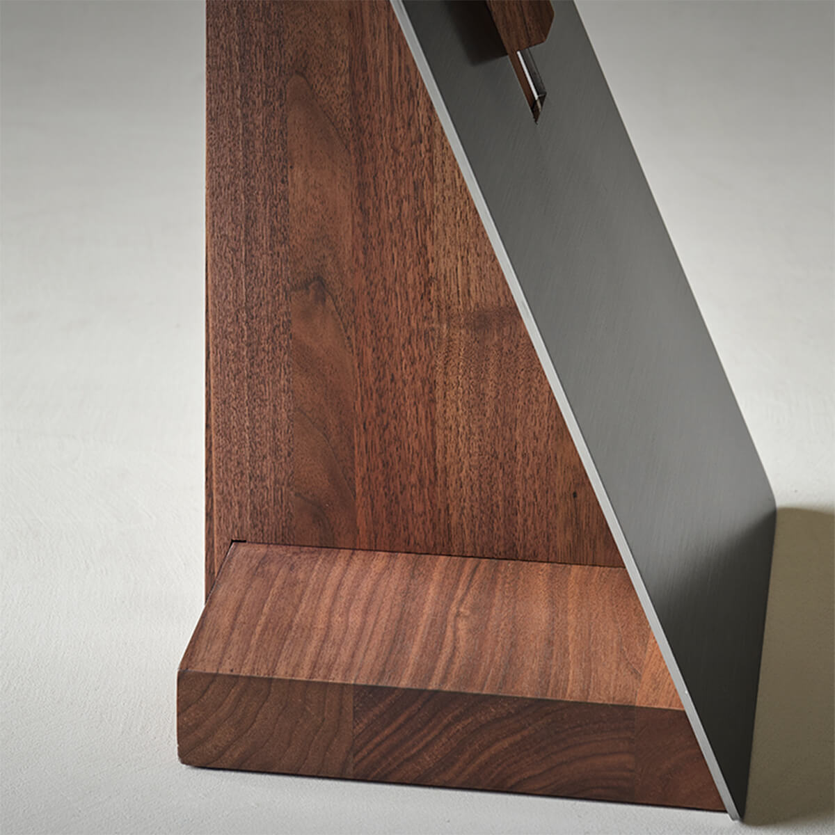 Close-up of the Graham side table with a solid American walnut base.