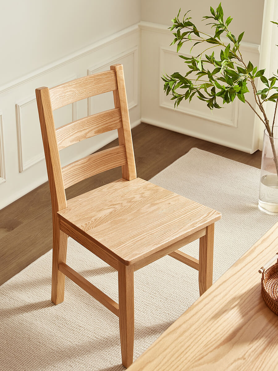 Angled view of the Grant solid oak dining chair