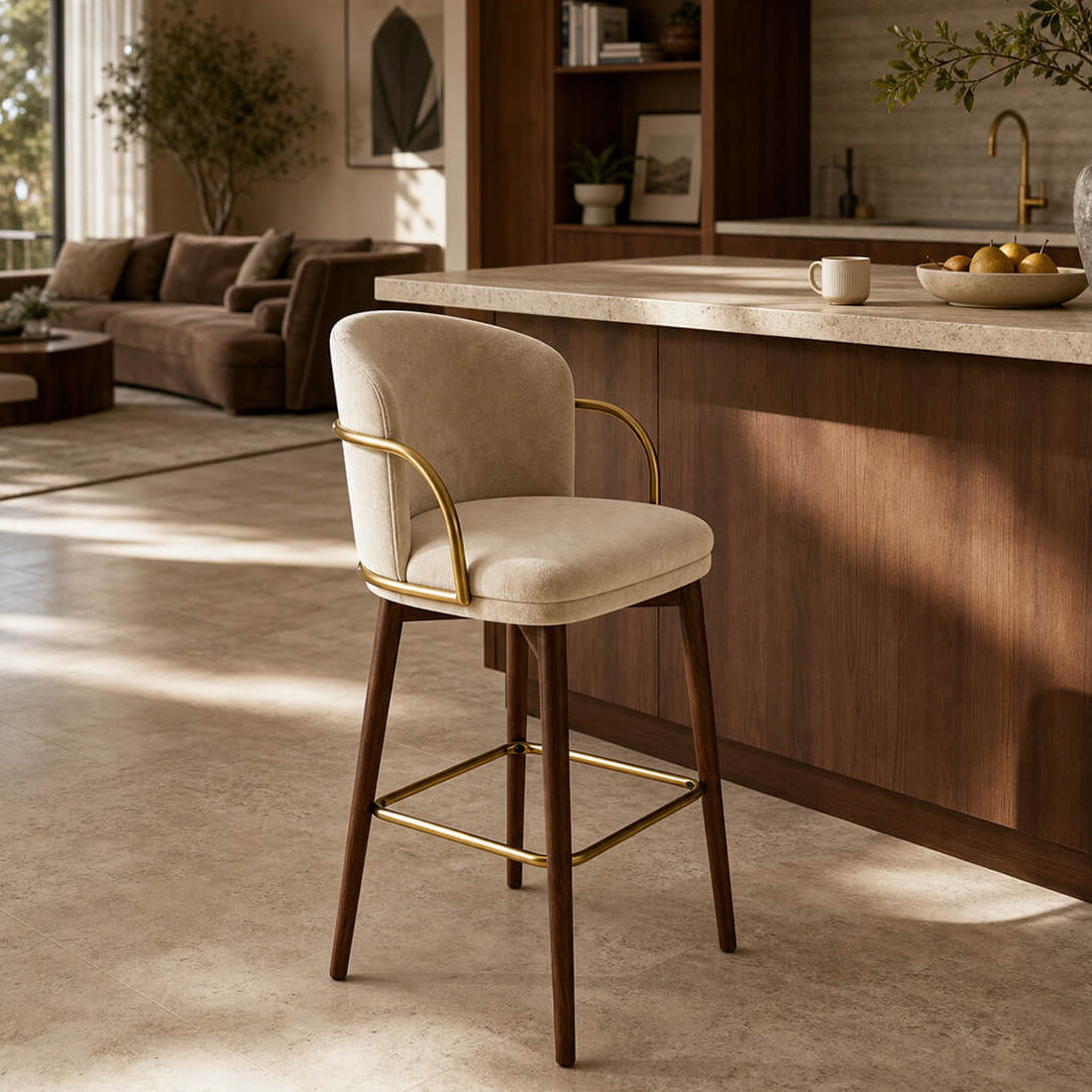 Harrington Bar Stool with beige upholstery and brass frame detail in modern kitchen