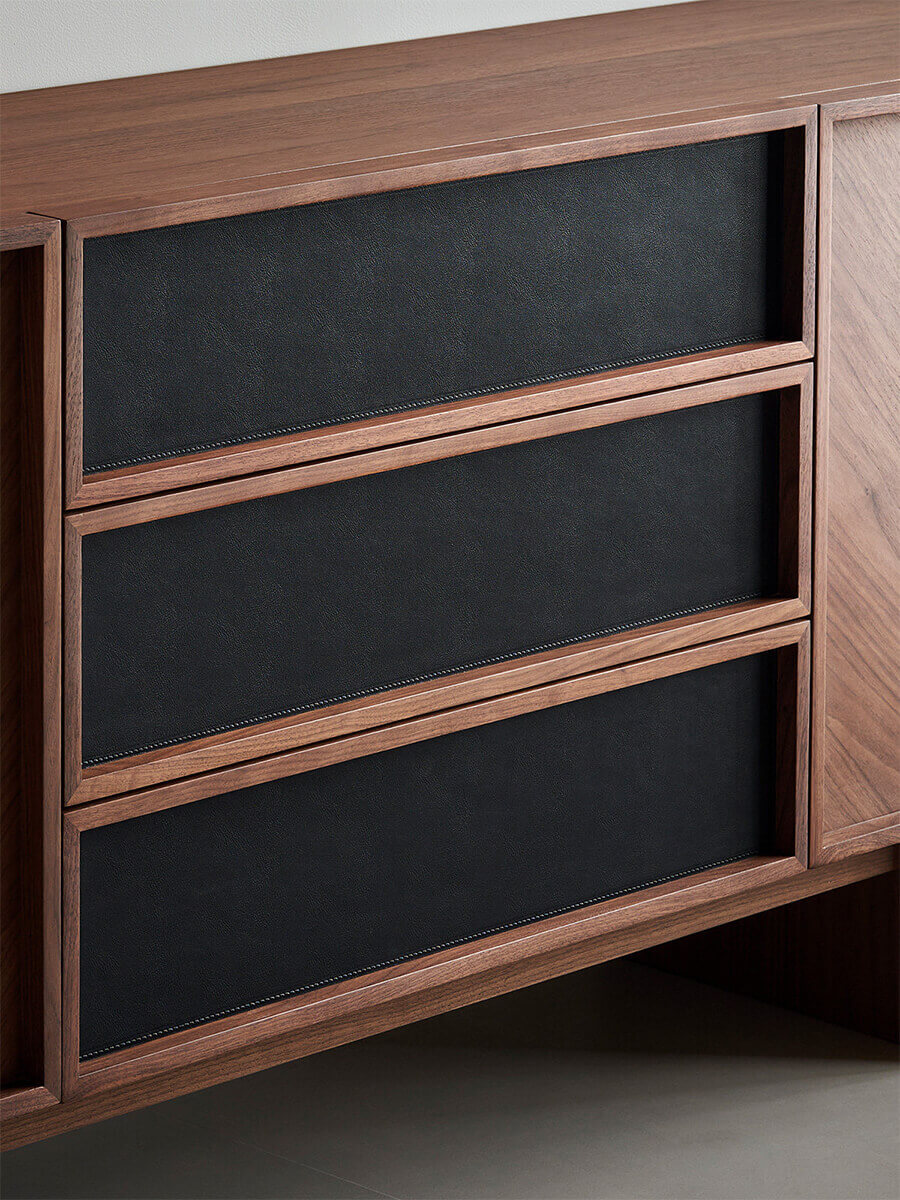 Saddle leather drawer fronts on Hayley walnut sideboard
