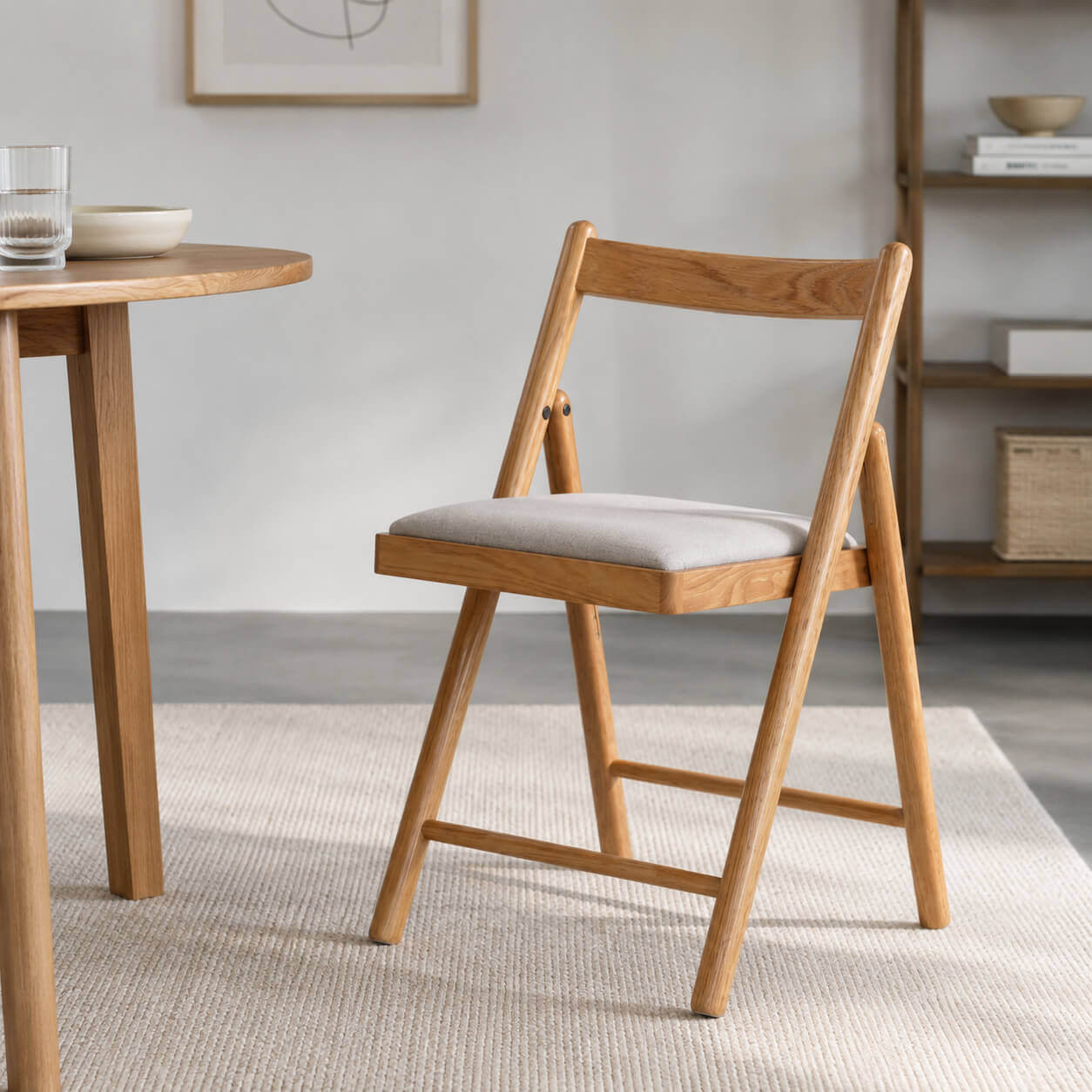 Hedrich solid oak folding chair in a contemporary dining room