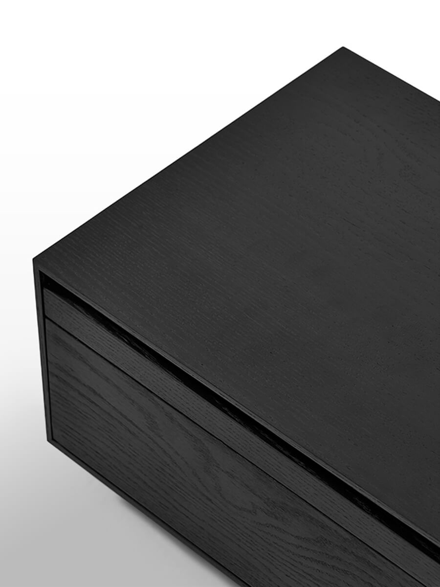 Black finish grain detail of Heidelberg bedside table