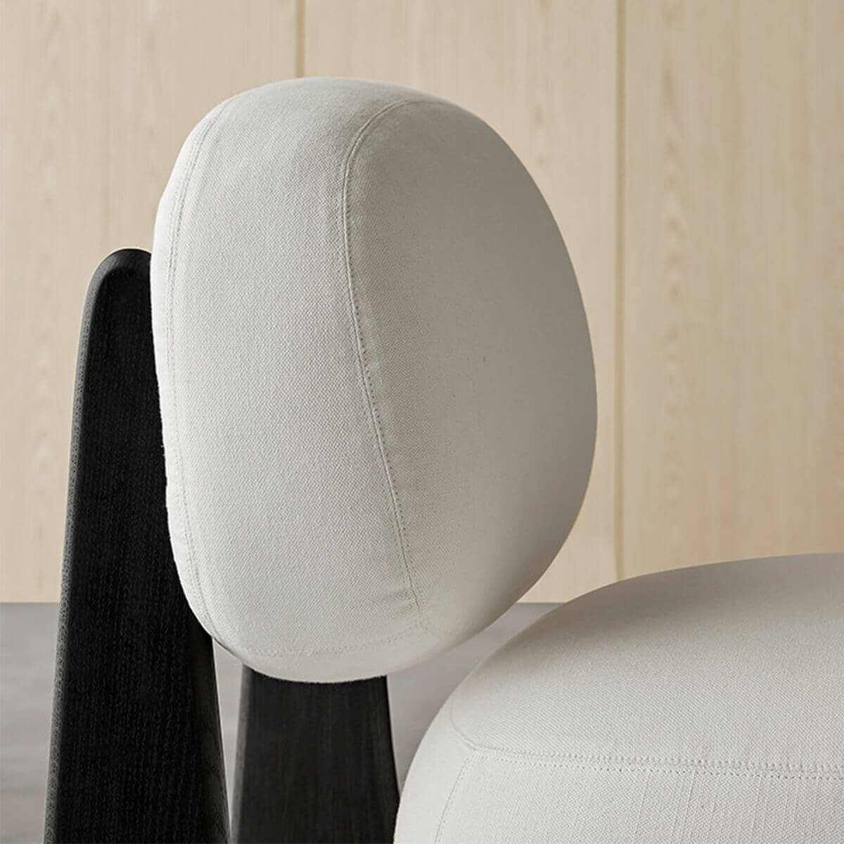 Close-up of the upholstered backrest on the Hetty Designer Stool