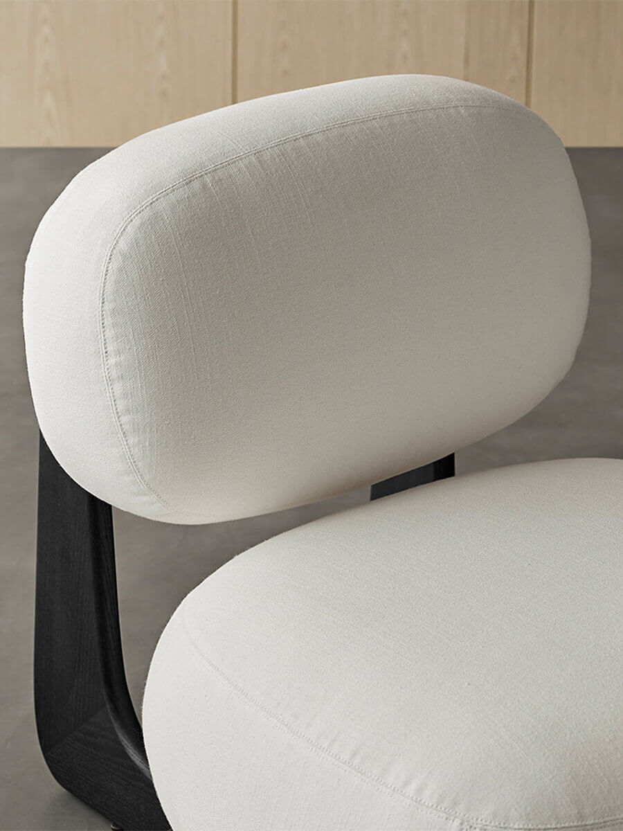 Side detail of the Hetty Designer Stool backrest and upholstery