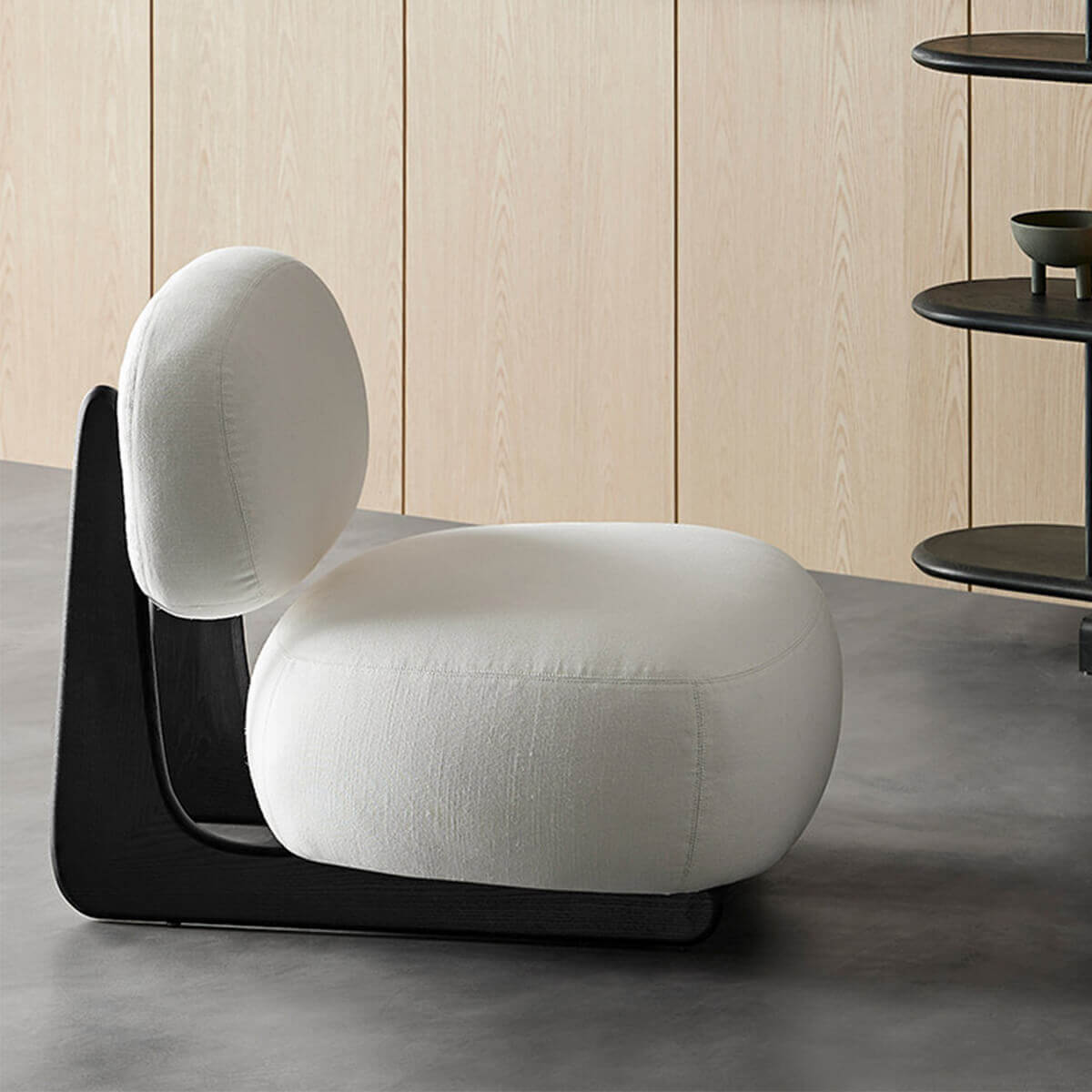 Side view of the Hetty Designer Stool with solid oak frame