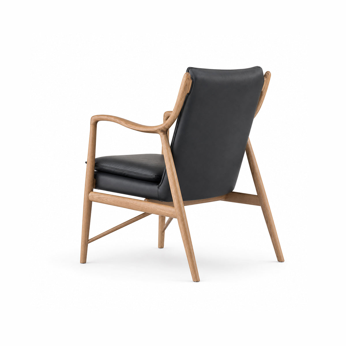 Hult armchair rear angle view showing solid ash frame construction