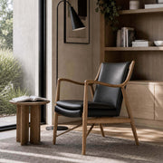 Hult armchair with top-grain leather upholstery and solid ash frame