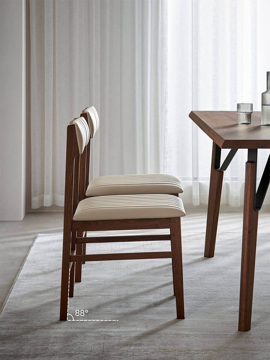 Jackson off-white leather dining chairs with solid walnut frames
